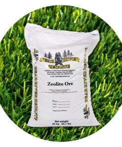 bag of zeolite artificial turf infill positioned in front of green grass